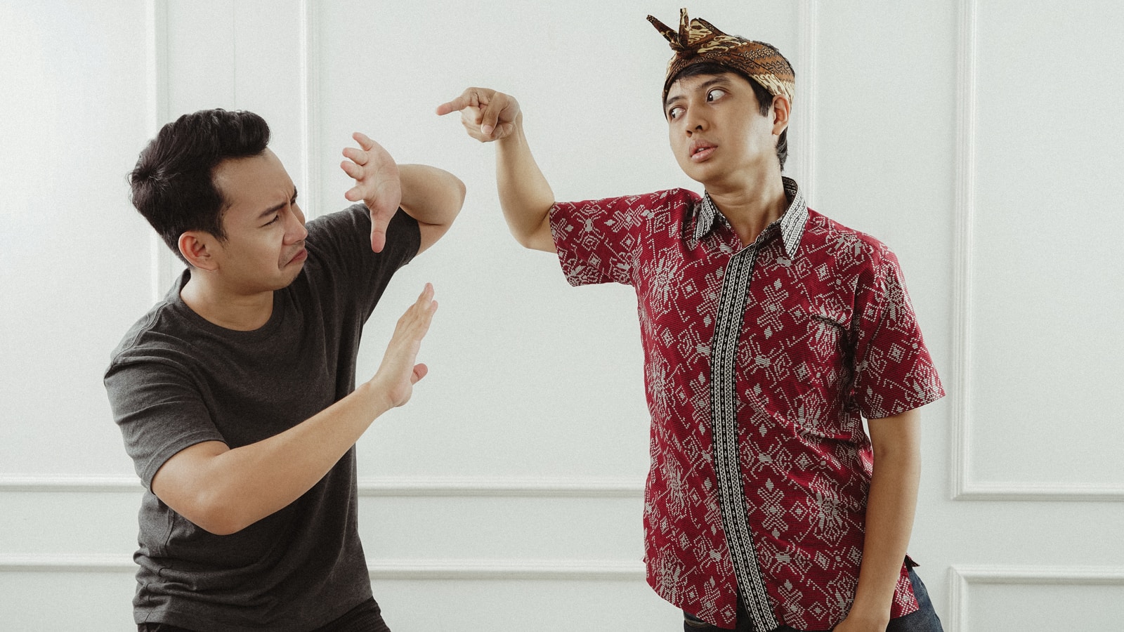 man in red and white button up shirt